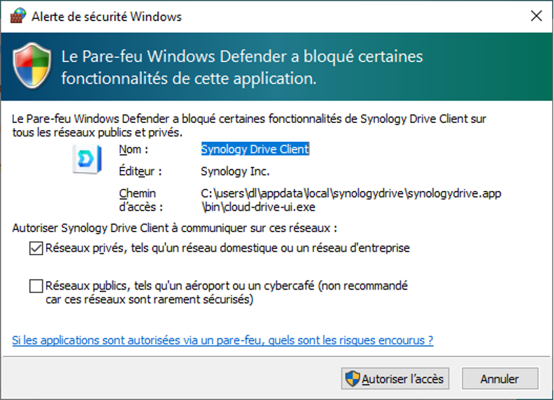 Fenêtre d'avertissement indiquant que Windows Défender a bloqué des fonctionnalités de Synology Drive Client
